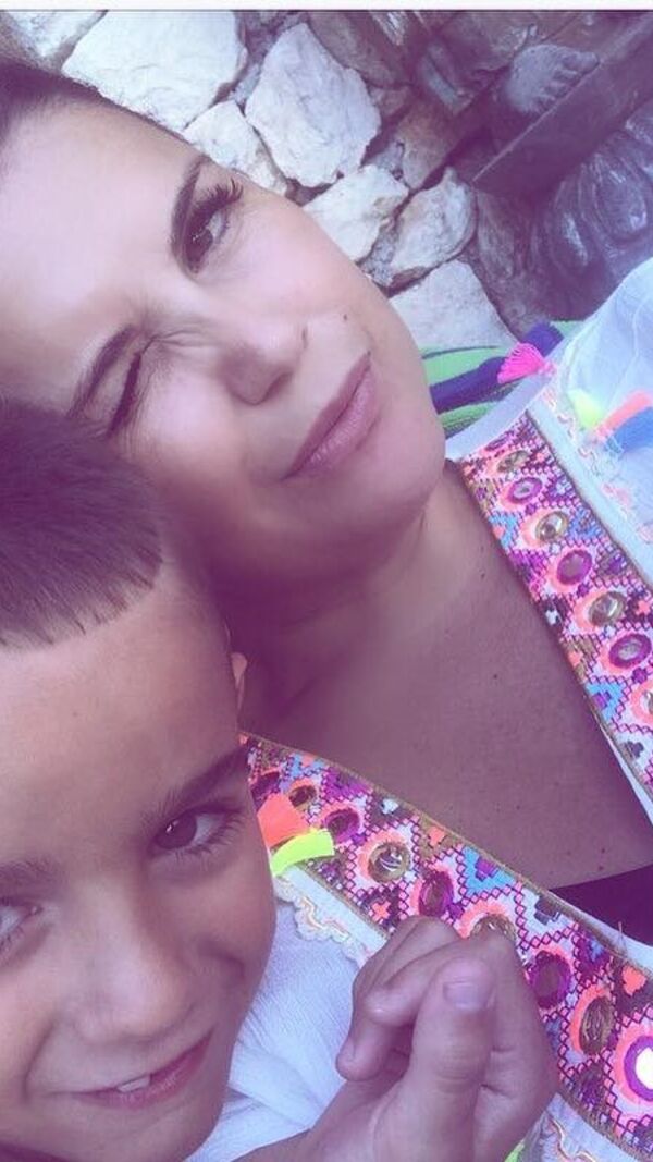 Katia Aveiro e os filhos
