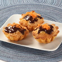 Queques de cenoura com cobertura de chocolate e fios de cenoura