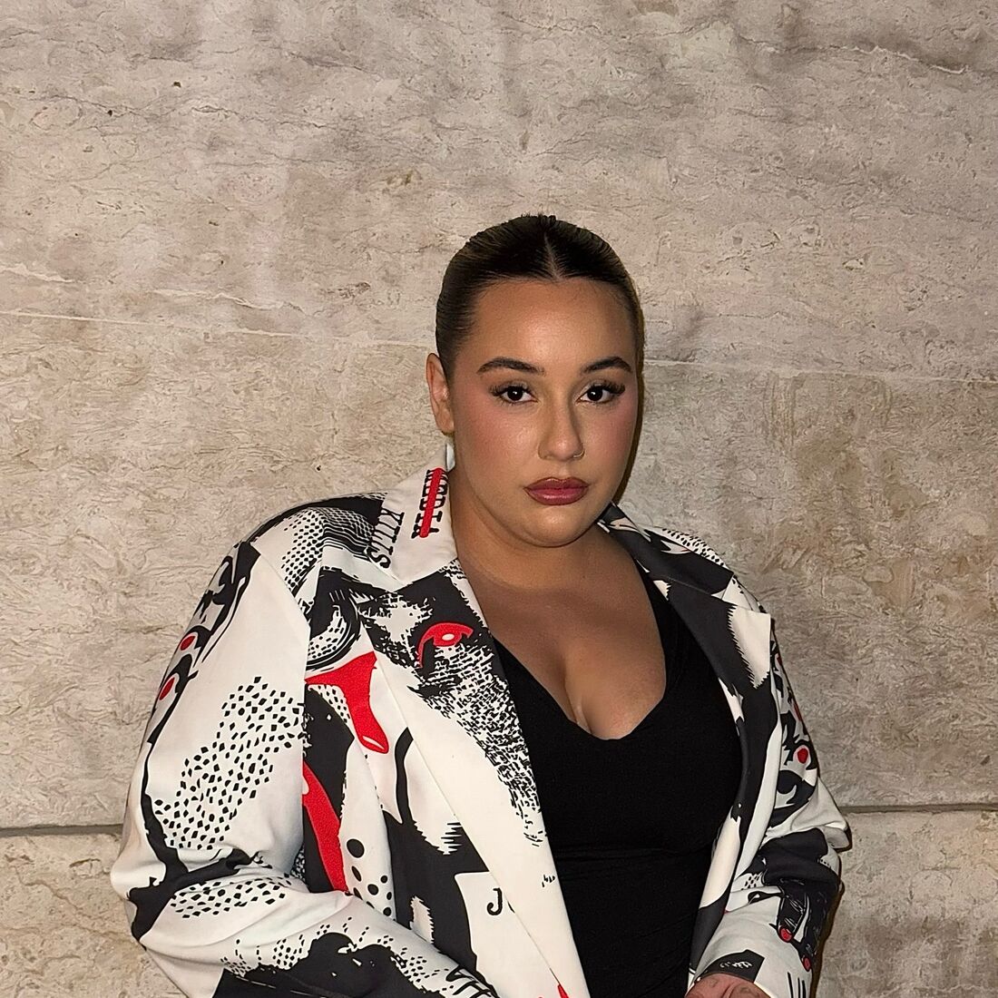 Nufla, Flávia Teixeira