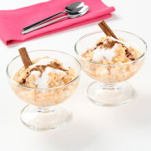 Doce de arroz e abóbora com pau de canela e creme