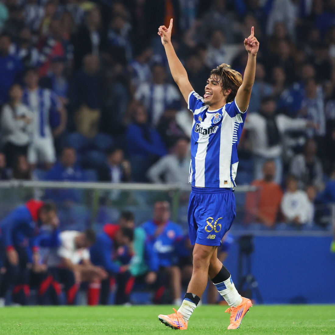 Porto's Rodrigo Mora celebrates with his teammates after scoring his side's second goal during the Europa League opening phase soccer