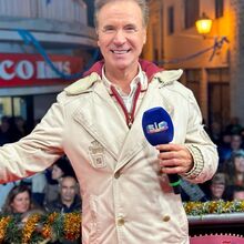 O cantor e apresentador alegre durante um "Domingão"